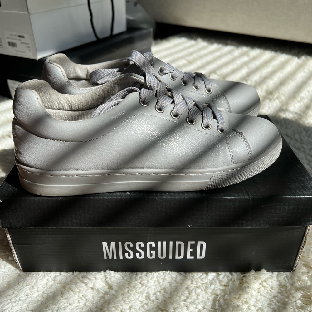 Grey matte faux leather lace up sneakers.